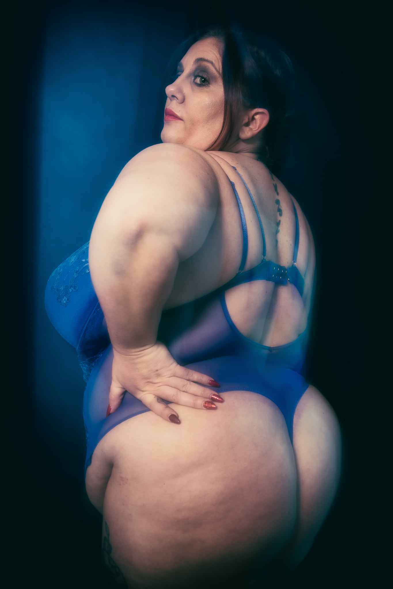 a person in blue lingerie